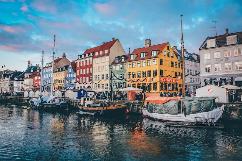Colorful houses along the River in Copenhagen, the cheapest city in Europe to fly into
