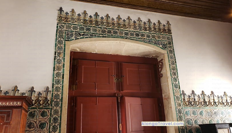 Beautiful stucco old door with tiles over it in Sintra Royal Palace