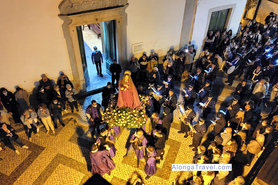 I'm watching Good Friday procession in front of a church in Olhao, Portugal from my hotel balcony