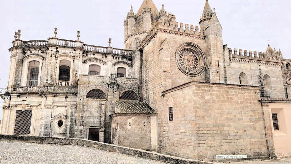 White building of Evora Cathedral with elaborated architectural details